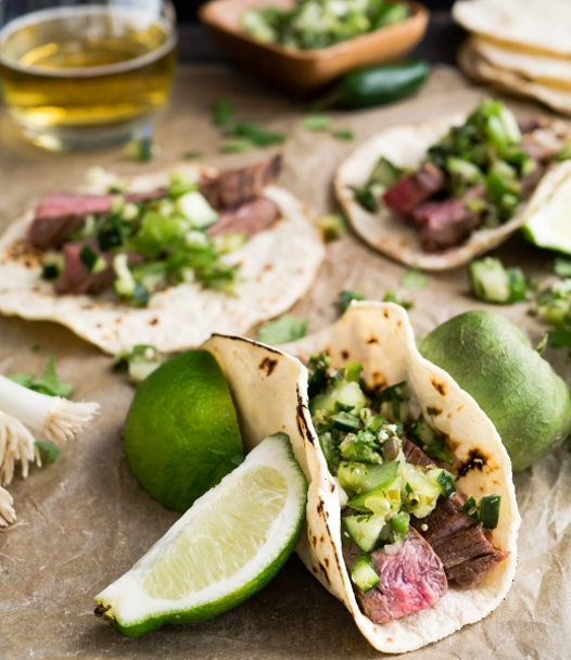Steak Taco with meat and vegetables.